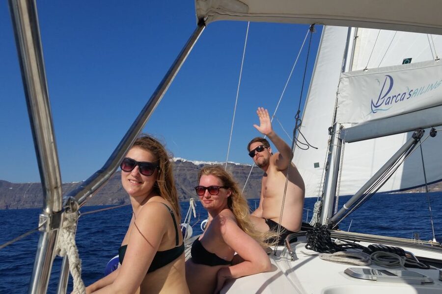 Santorini Caldera: Sunset Sailing Cruise with Meal - White Beach and the southern coast