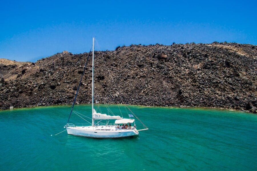 Santorini Caldera: Sunset Sailing Cruise with Meal - Palea Kameni and the warm spring stop