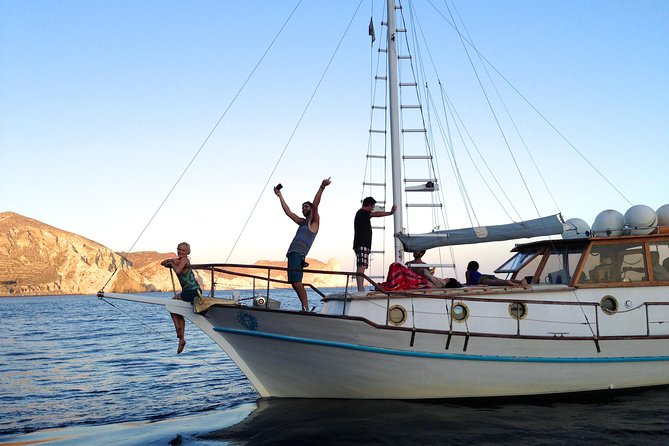 Santorini Caldera Sunset Traditional Cruise with Meal and Drinks - From hotel pickup to Ammoudi Bay