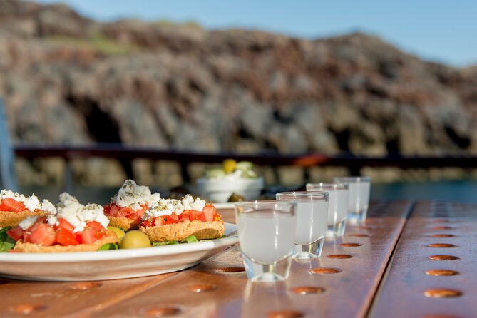Santorini Caldera Sunset Traditional Cruise with Meal and Drinks - White Beach and Red Beach from the sea