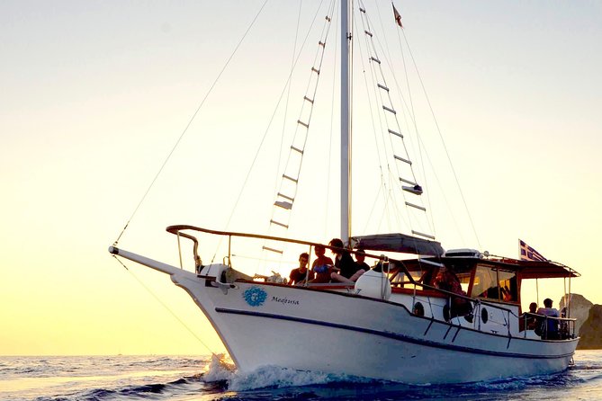 Santorini Caldera Sunset Traditional Cruise with Meal and Drinks - Food, crew, and the mood onboard