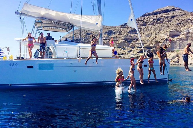 Santorini Catamaran Cruise with Fresh Meal and Open Bar - White Beach and the southern coast