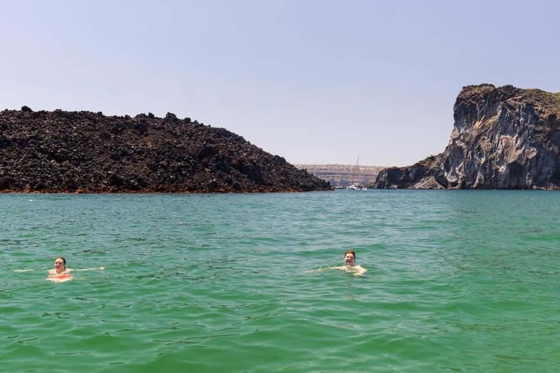 Santorini: Catamaran Cruise with Fresh Meal & Open Bar - Seeing the caldera from sea level