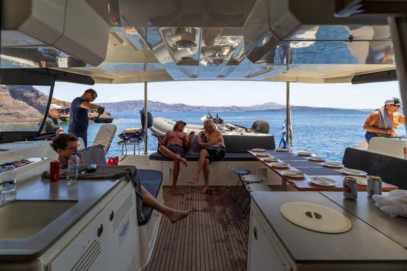 Santorini: Catamaran Cruise with Fresh Meal & Open Bar - What the crew adds to the trip