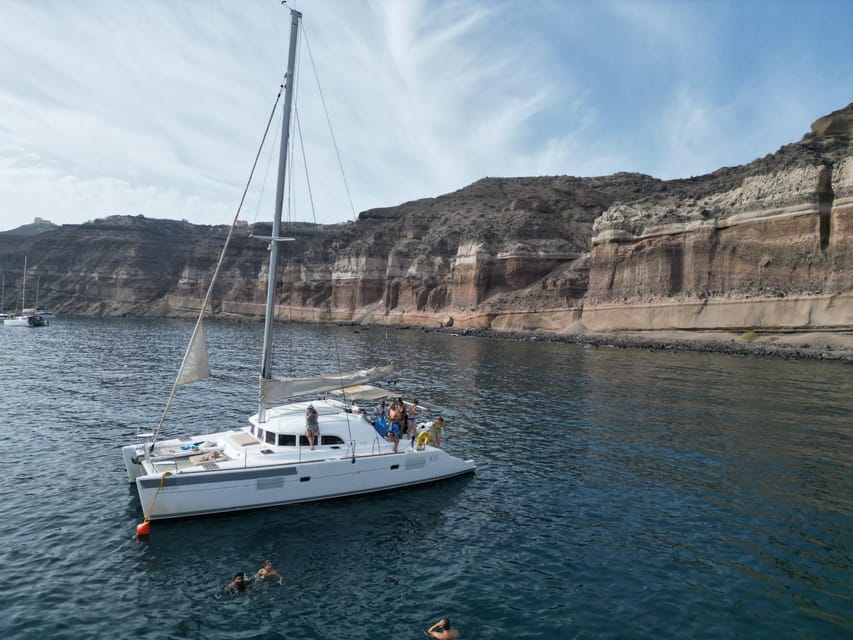 Santorini: Catamaran Cruise with Greek BBQ and Drinks - Entering the caldera near Nea Kameni