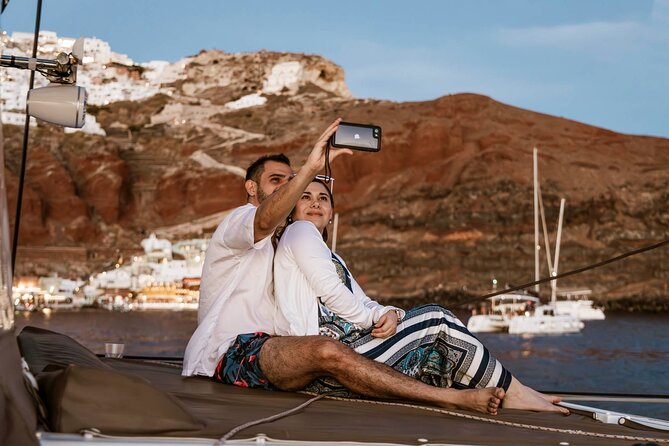 Santorini Catamaran Cruise with Greek Meal, Open-Bar and Sunset - The sunset route and views of Oia