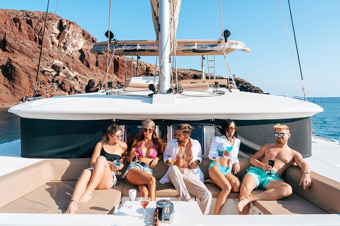 Santorini Catamaran Cruise: with Lunch, BBQ, Open Bar, Transfers - How the food, drinks, and crew affect the day