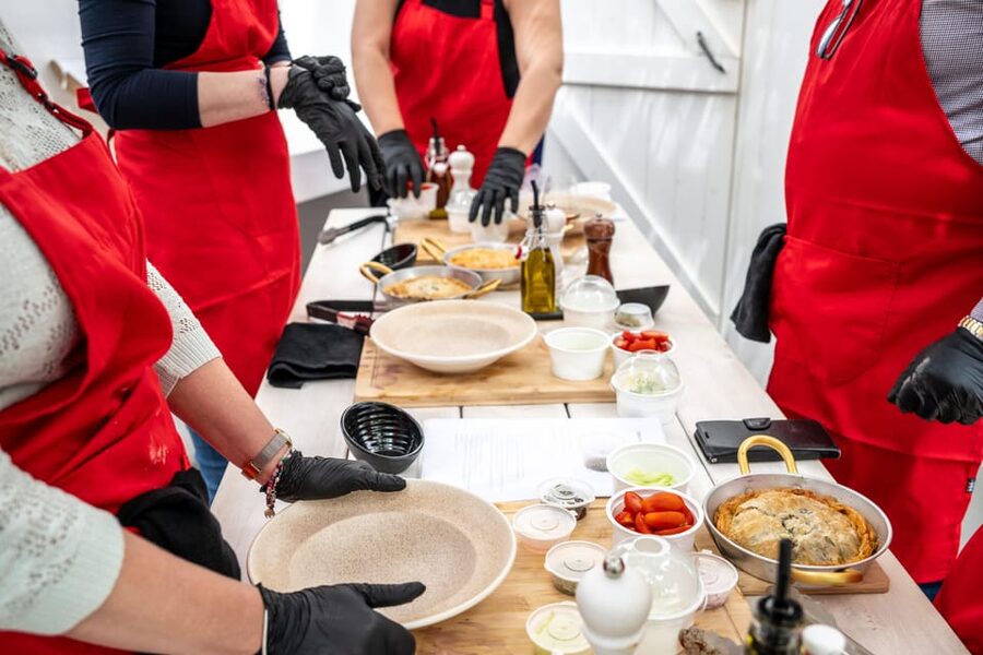 Santorini: Cooking Class with Lunch and Wine Tasting - From student to lunch guest