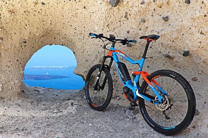 Santorini E-bike Adventures - The Original Bike Tours - Old paths lead toward Santorini’s village life