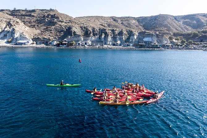 Santorini Guided Sea Kayaking with Light Lunch and Pick-up Option - Black, White, and Red Beaches Along the Southern Coast