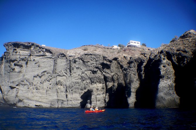 Santorini Guided Sea Kayaking with Light Lunch and Pick-up Option - The Greek Lunch Is More Than a Quick Snack