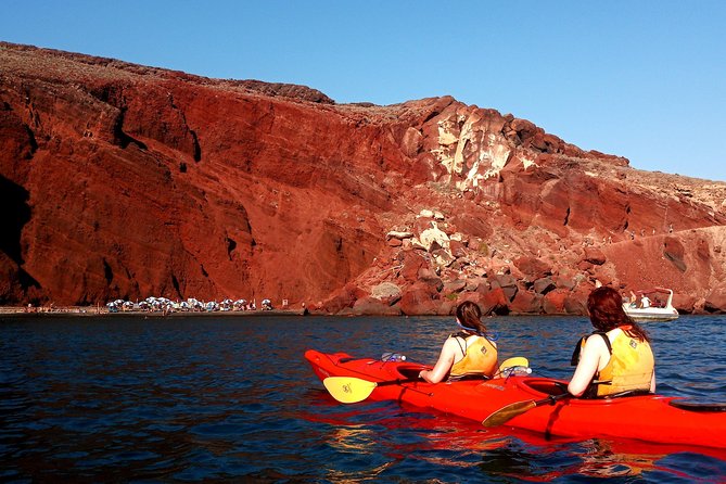 Santorini Guided Sea Kayaking with Light Lunch and Pick-up Option - The Sea Cave and Volcanic Rock Formations