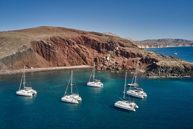 Santorini: Luxury Catamaran Cruise with Fresh Fish BBQ & Drinks - Pickup from Imerovigli and the trip to the pier