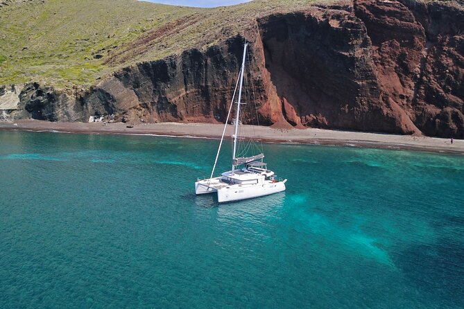 Santorini: Luxury Catamaran Cruise with Fresh Fish BBQ & Drinks - Swimming at Mesa Pigadia Beach