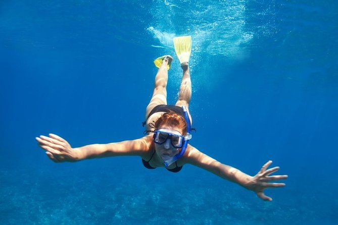 Santorini Luxury Catamaran Day Cruise with BBQ,drinks,transfer - White Beach, snorkeling, and lunch on deck