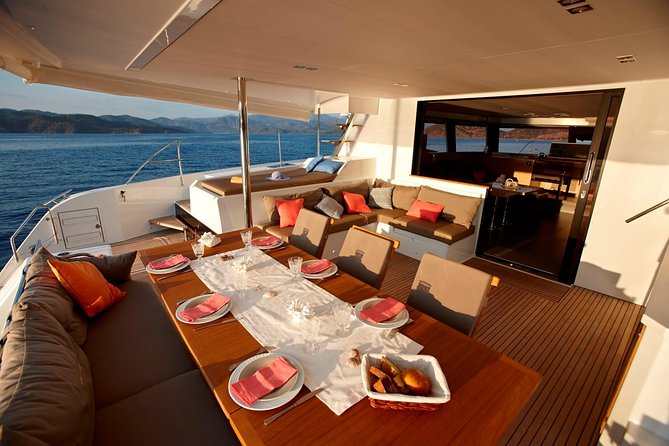 Santorini Luxury Catamaran Day Cruise with BBQ,drinks,transfer - Red Beach and the final swim