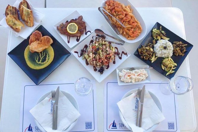 Santorini Luxury Catamaran Sunset Cruise with BBQ, Drink and Transfer - Boarding at Ammoudi or Athinios
