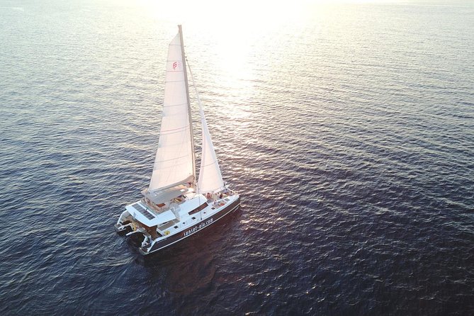 Santorini Luxury Catamaran Sunset Cruise with BBQ, Drink and Transfer - Swimming at the Hot Springs
