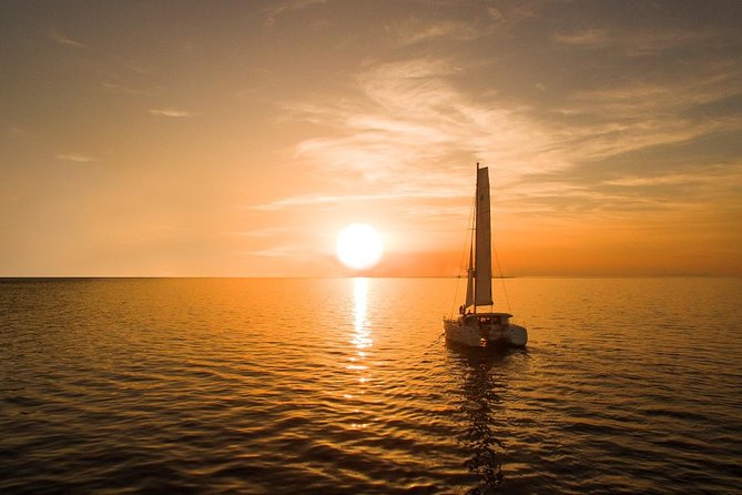 Santorini Luxury Catamaran Sunset Cruise with BBQ, Drink and Transfer - Red Beach From the Sea