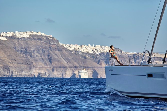 Santorini Luxury Sailing Catamaran Cruise with BBQ, Drinks and Transfer - Safety, weather, and small practical details
