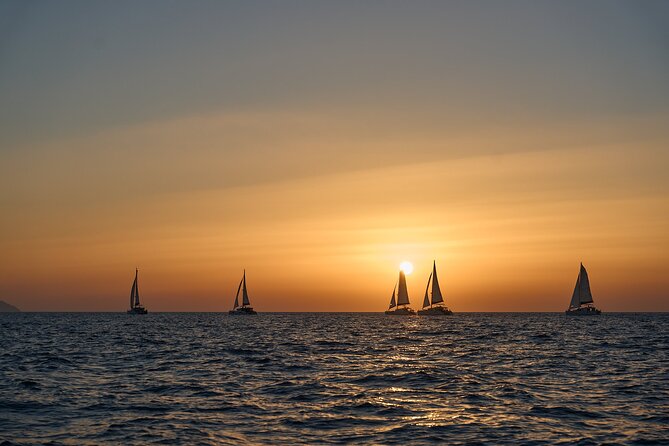 Santorini Oia: Luxury Sunset Cruise with Fresh Fish BBQ & Drinks - Why see Santorini from the sea?