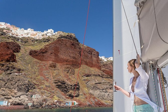 Santorini Private Catamaran Cruise with BBQ, Open Bar & Transfers - Palea Kameni hot springs: warm water with a catch