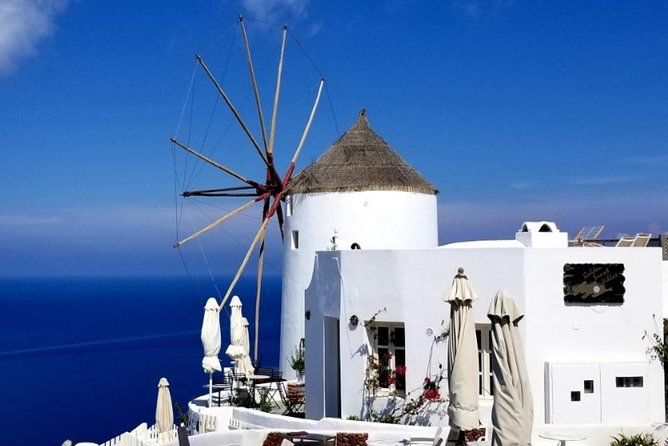 Santorini Private Driver: Explore Santorini - Port & Hotel Pickup - Prophet Elias offers the island from above