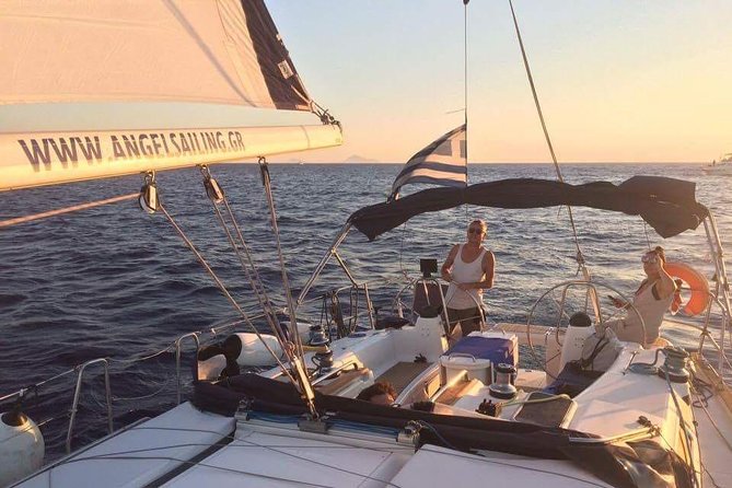 Santorini Private Sunset Sailing Tour with Dinner, Drinks &Transfer included - The Crew: Captain George, Elias, and Ina