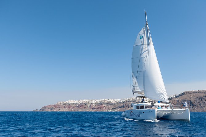 Santorini Small-Group Catamaran Sailing Trip(BBQ,drinks, transfer) - Swimming near the hot springs