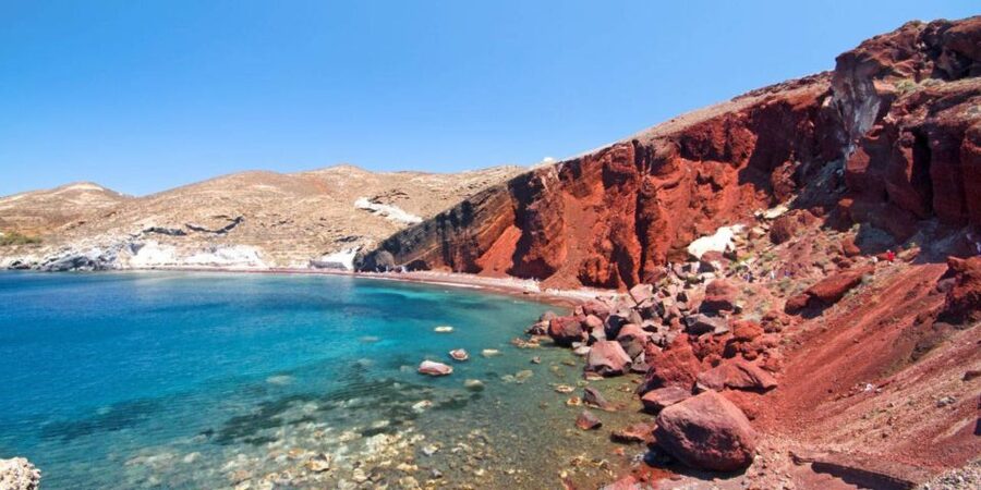 Santorini: Sunset Guided Tour with Hotel Pickup - Hotel pickup, van travel, and the first hour