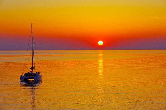 Santorini Sunset Luxury Sailing Catamaran Cruise with BBQ, drinks, transfer - Hotel pickup and the start at Vlychada Port