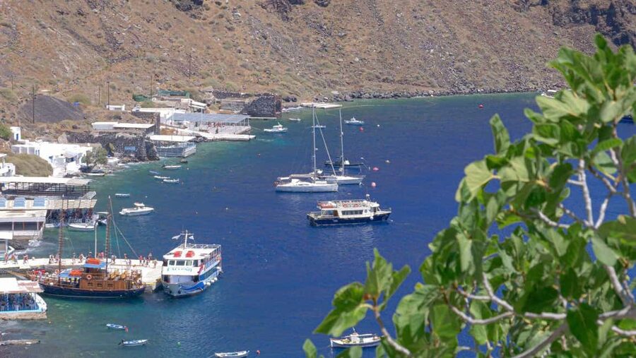 Santorini Volcano, Hot Springs Adventure - Sailing out from Fira’s Old Port