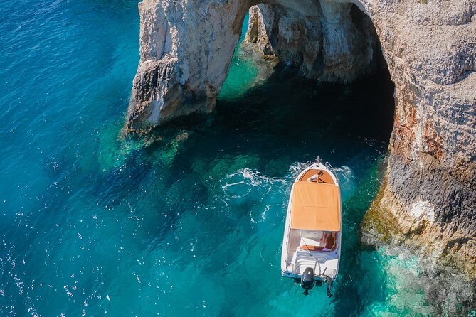 Shipwreck and Blue Caves- 8m Private Boat Tour (up to 11pax) - Cruising past Xygia Beach and its sulphur waters