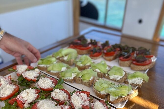 Small Group Kaiki Cruise & Greek Gastronomy Experience - Tsimintiri: the long stop and the main meal