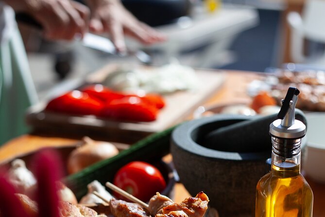 Souvlaki Cooking Class with Locals – Transfer Included - Making tzatziki from local ingredients