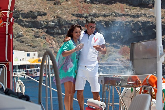 Sunset Sailing Catamaran Cruise in Santorini with BBQ and Drinks - A five-hour view of Santorini from the sea