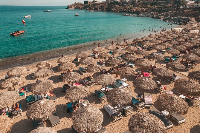 Super Paradise Beach Mykonos Seaside Sunbed (1st row) - What the day feels like from arrival to departure