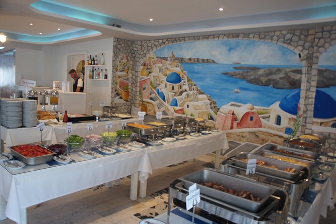 Traditional Greek Night live Music & Dinner Show in Santorini - Getting to Kamari and controlling the total cost