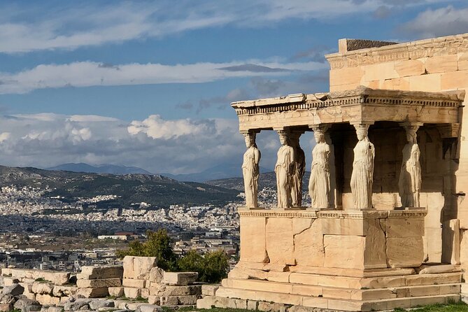 Visit of the Acropolis with an official guide in Spanish - Looking down at the Odeon of Herod Atticus