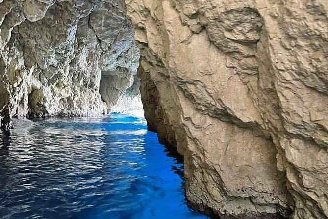 Zakynthos Blue Caves and Navagio bay - Entering the Blue Caves by a small boat
