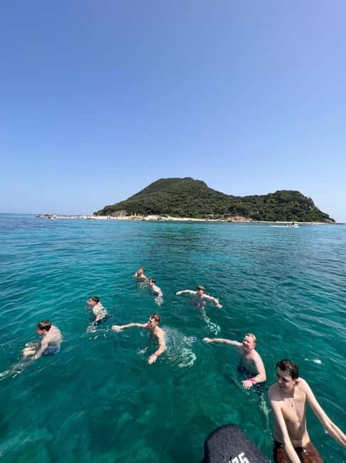 Zakynthos: Turtles, Marathonisi & Keri Caves Speedboat Tour - Passing Cameo Islet and its dramatic rock setting