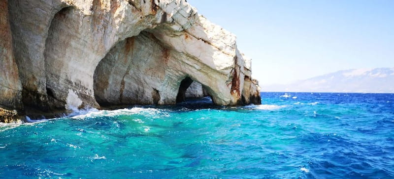 Zakynthos: Xigia, Navagio Shipwreck and Blue Caves Boat Tour - Leaving Alykes for the western coast