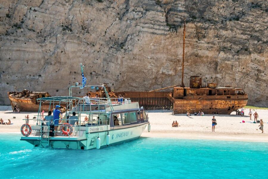 Zante: Half-Day Tour to Navagio, Blue Caves & White Beach - Riding from the resort toward the old olive tree